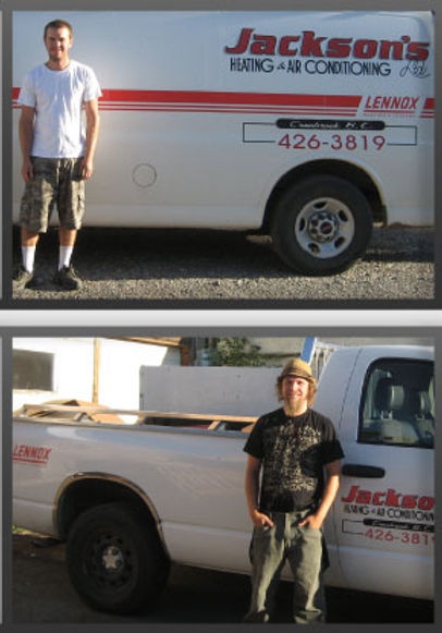 Jackson's Heating team members beside company service vehicles